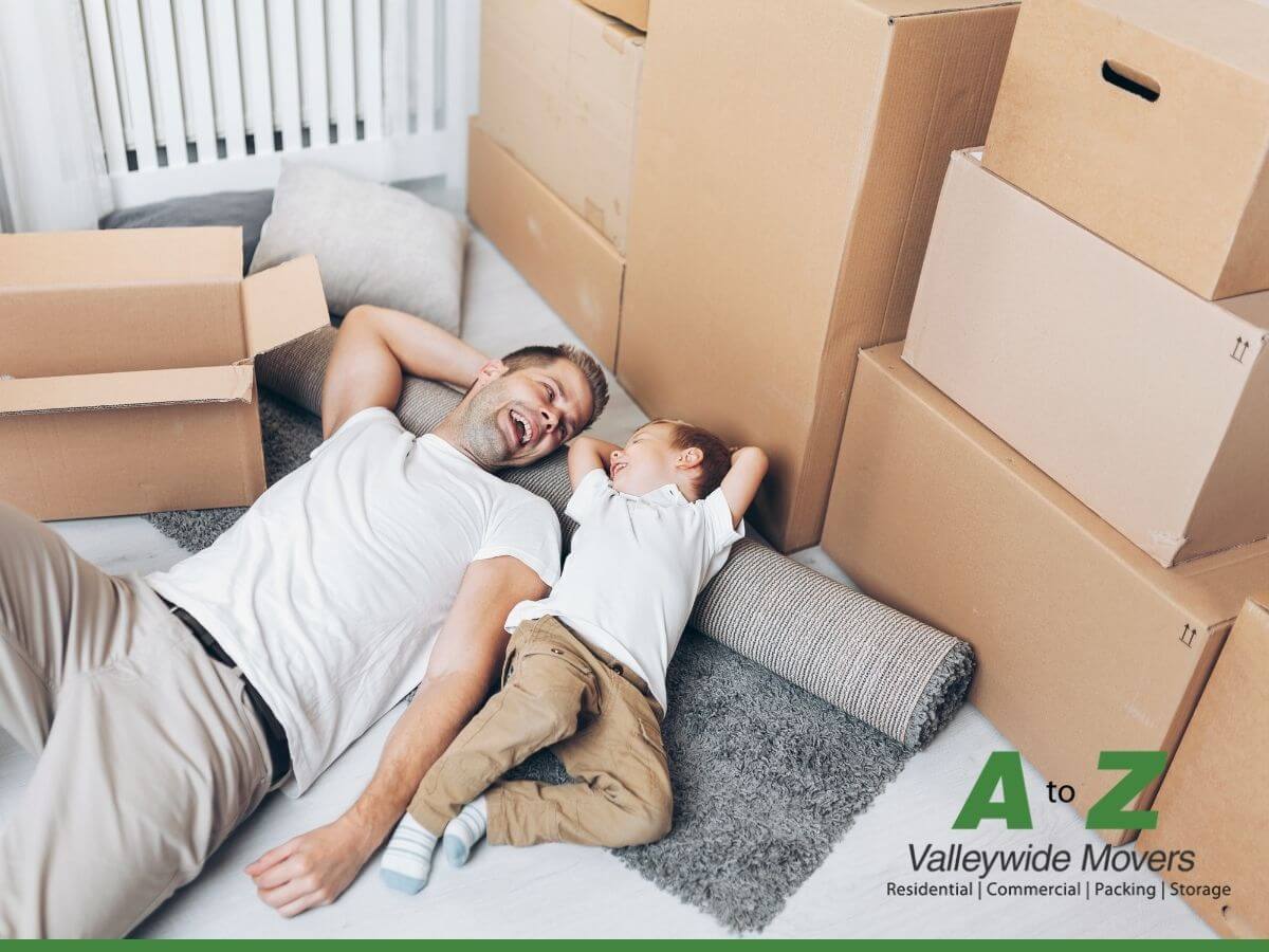 Father and his son relaxed on moving day with tips from A to Z Valleywide movers blog