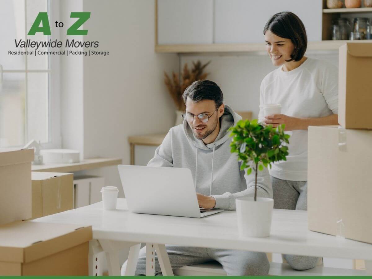 Married couple organizing their move with tips from A to Z Valleywide movers blog